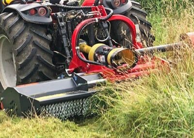 SMWA s cutting long grass up close