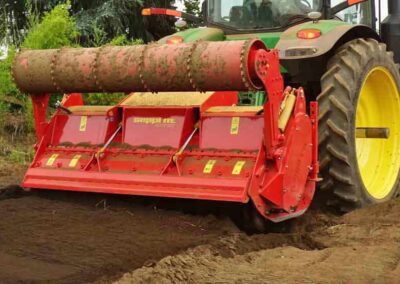 Multiforst tilling soil up close