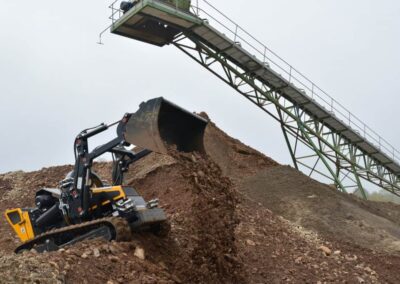 ROBO bucket on a mound of dirt