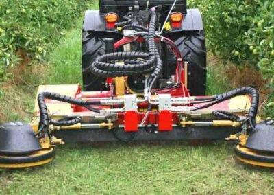 XSC cutting grass under trees