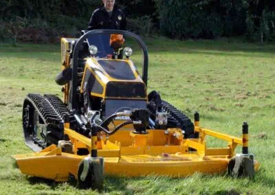 Robo turf mower in action with operator
