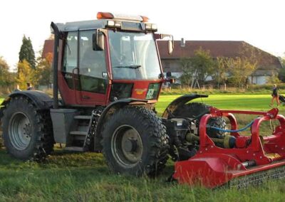 Seppi WBS attachment on a tractor cutting grass