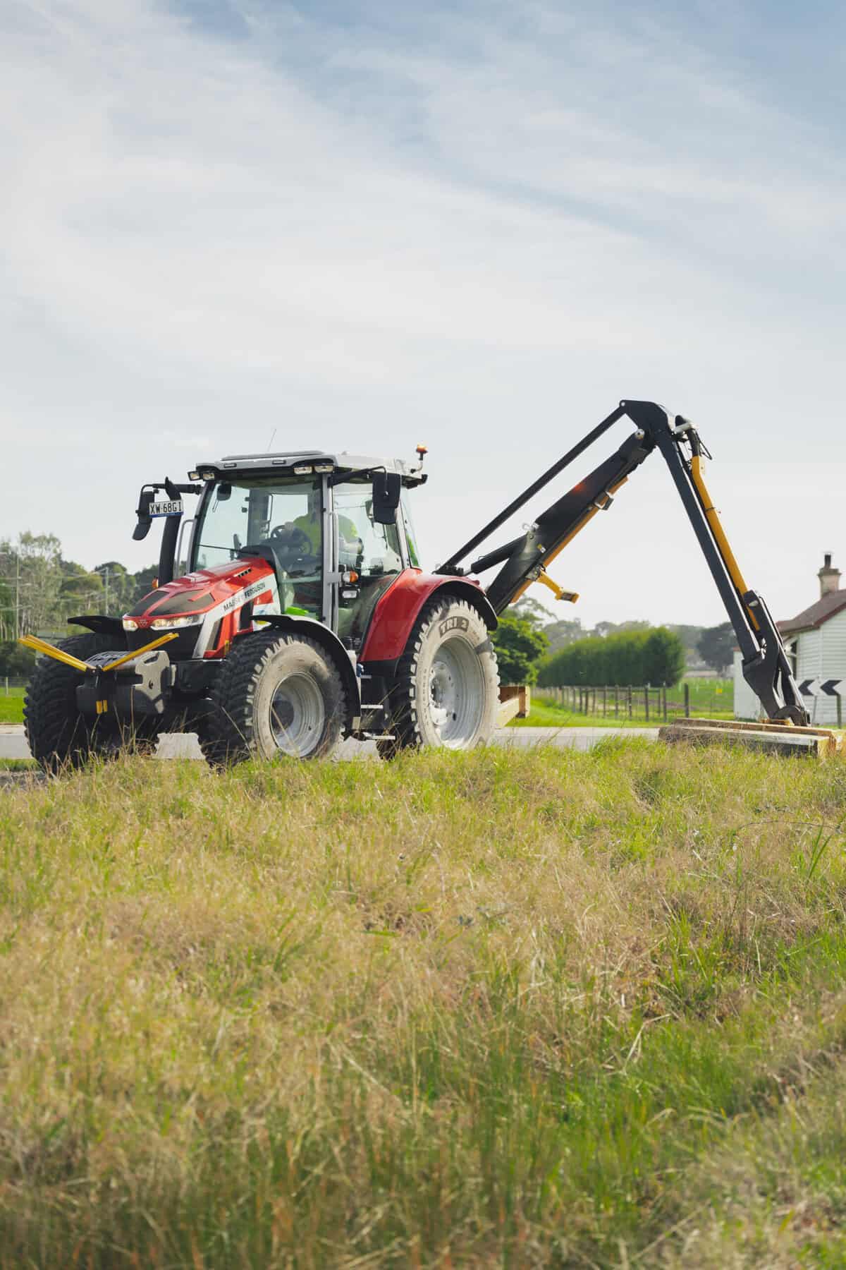 Huxley Roadside Services attachment connected to the tractor